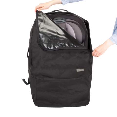 Travel Everywhere Car Seat Carry Bag - woman opening bag revealing car seat inside